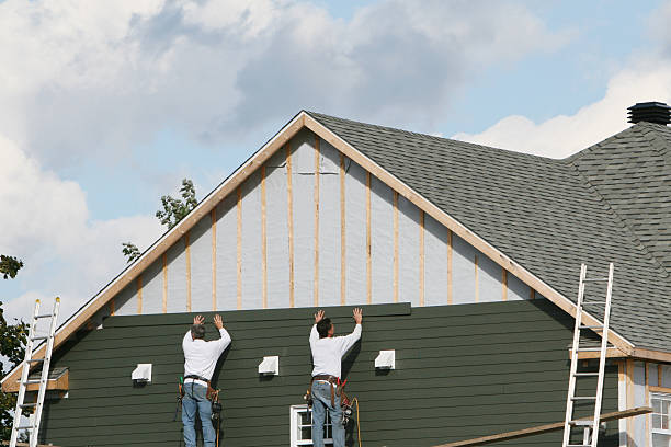 Professional Storm Damage Siding Repair technician working in Sardinia, OH